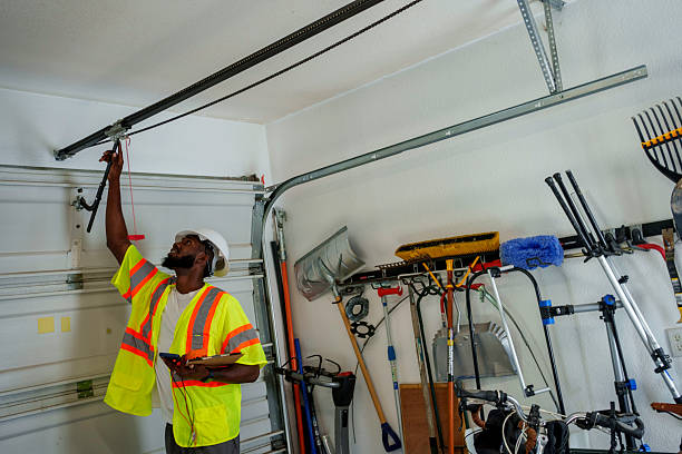 Professional Garage Door Panel Replacement technician working in Monroe, IA